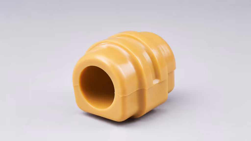 Industrial polyurethane rollers and wheels installed on a conveyor in a manufacturing facility